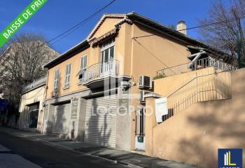 Immeuble commercial et habitation à vendre - Proche centre-ville